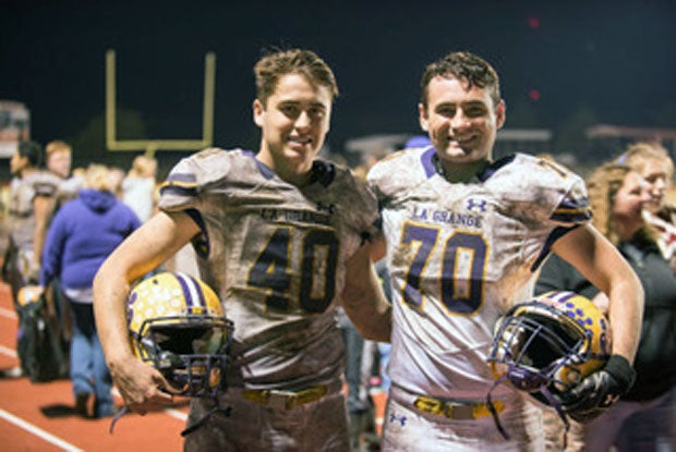 Brothers Grant Juno (40) and Mason Juno (70) played side-by-side for the La Grange football team in 2018.