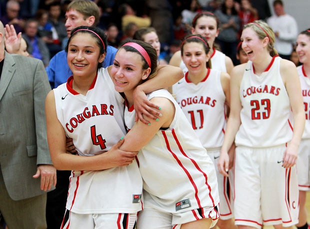 Carondelet senior Natalie Romeo is bear hugged by Vanessa Cruz. The Cougars play Miramonte Tuesday at De La Salle in one of the most anticipated games of the year in the Northern California Open Division semifinals. 