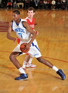 Price's Skylar Spencer drives
to the basket. 