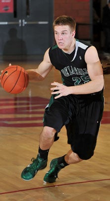 De La Salle's Travis Pacos was the
game's leading scorer with 17. 