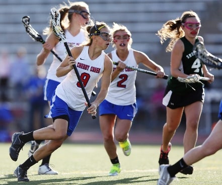 Cherry Creek senior Mara Bandt-Law (9) scored seven goals for the defending champions in the state lacrosse semifinals Saturday against Centaurus. The Bruins won 25-15. They will meet Air Academy in the finals.