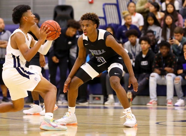Bronny James scored 10 points in his high school basketball debut Thursday night.