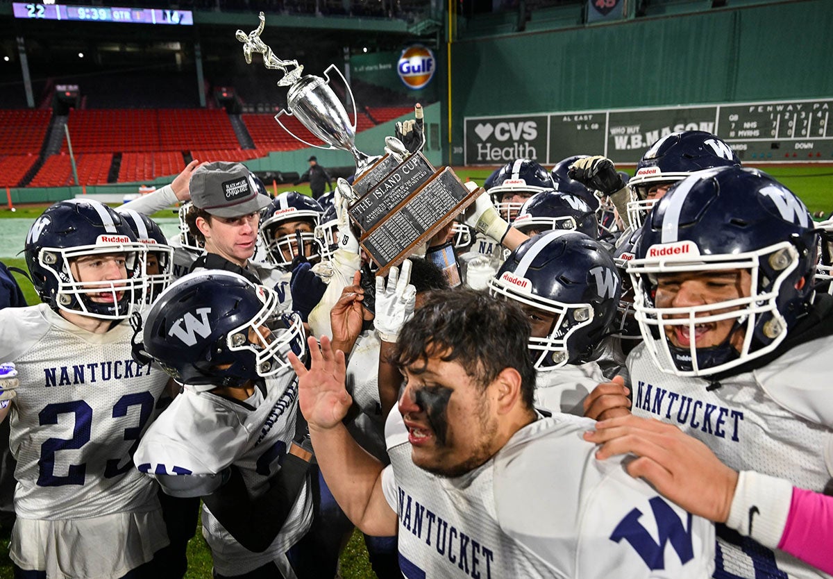 Nantucket holds up The Island Cup after defeating rival Martha's Vineyard Regional 22-14 at Fenway Park. Four games across two days were held at the historic Boston venue on Nov. 26 and 27. (Photo: Mike Braca)