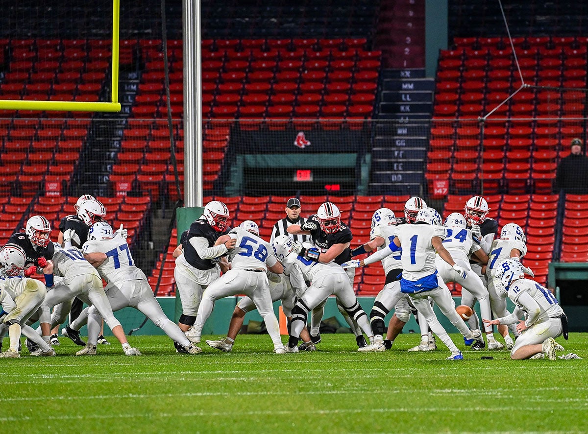 Stoneham kicks an extra-point in its 42-14 win over Reading Memorial at Fenway Park. (Photo: Mike Braca)