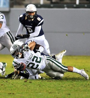 Yards were tough to come by for De La Salle'sJohn Velasco, who finished with 93 yards and a TD.