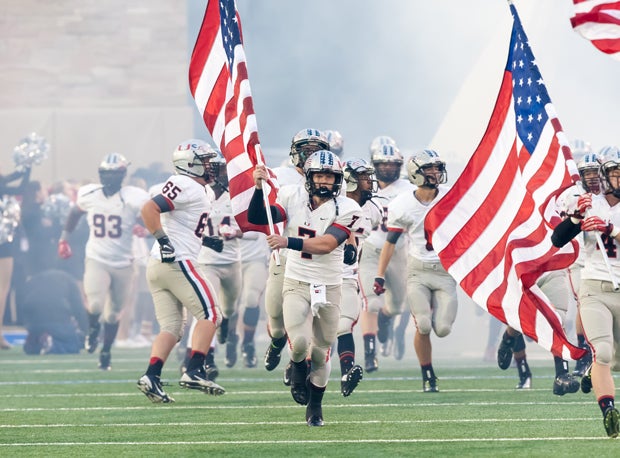Union enters the field before its game against Jenks.