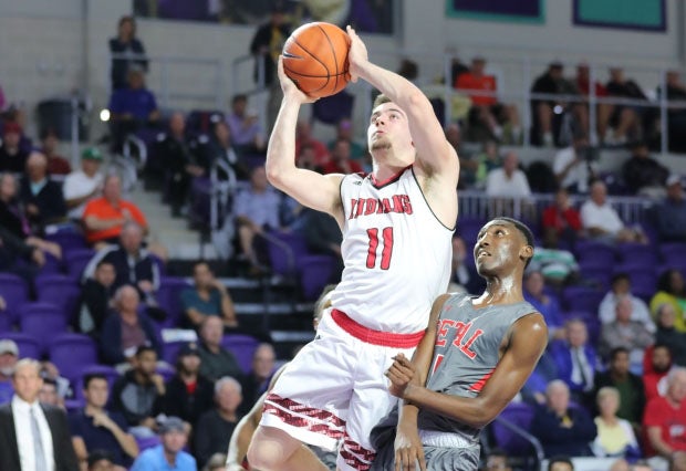 Joe Girard scored 50 points on Saturday, including the game-winning shot in overtime, leading Glens Falls to its first New York state title.