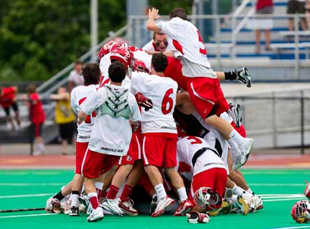No. 3 Jamesville-DeWitt players celebrate their second straight New York Class B boys lacrosse title.