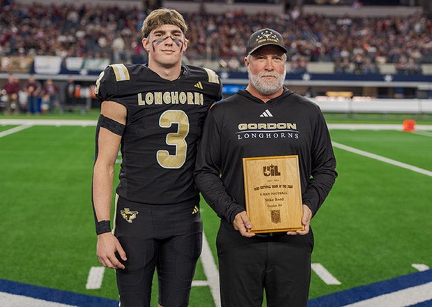 Stryker and Mike Reed on the field at AT&T Stadium in December prior to the Conference 1A Division 1 state championship game. (PHOTO: Alex Garza)