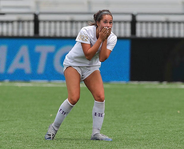 Brooke Gimbel of Holy Family (Colo.) is stunned after scoring the game-winning goal to upset Evergreen in the CHSAA 4A state soccer championship.