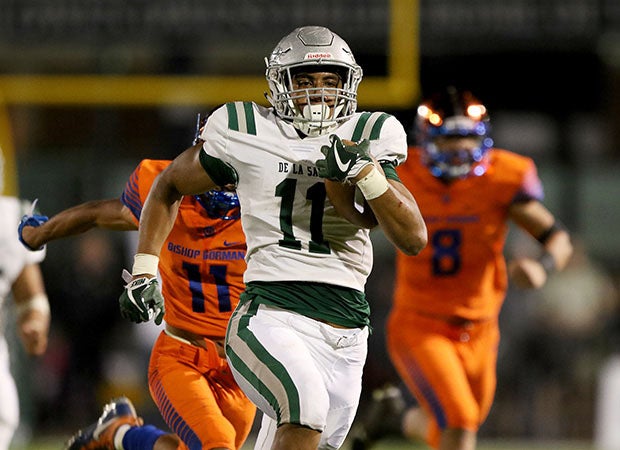 De La Salle's Henry To'oto'o (11) breaks loose for his first touchdown run, a 53-yarder late in the second quarter. 