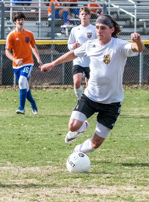 Whittle joined the soccer team in an effort to help
the squad reach the playoffs.