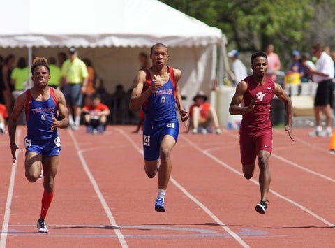 Fountain-Fort Carson senior Donovan Williams, center, enters the Class 5A state meet with the classification's top times in the 100 and 200 meters. The state meet for all classes begins Thursday morning at Jeffco Stadium in Lakewood.