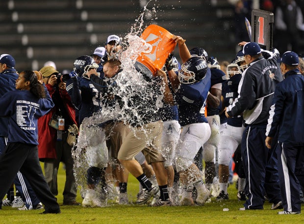 Bakersfield Paul Golla is doused with water following his team's 56-26 win over Del Oro in Friday's CIF Division I Bowl Game at StubHub Center in Carson.