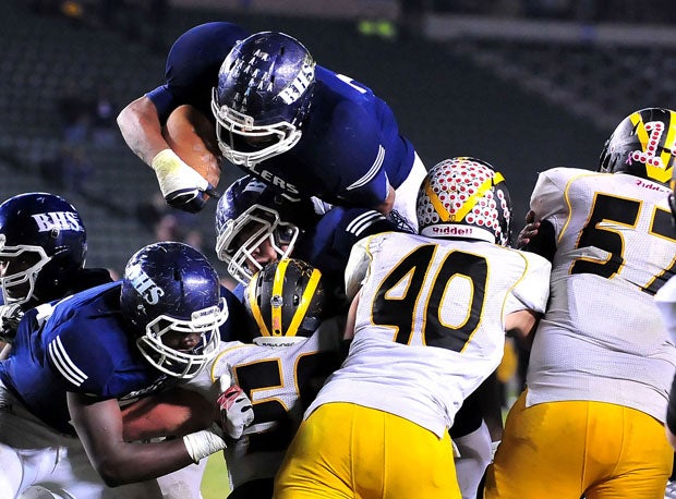Bakersfield running back Marcus Bruce goes over the top to score a 1-yard touchdown with 4:48 left in the fourth quarter to seal the victory.