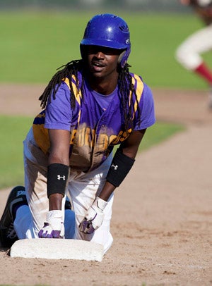 Ahmad is always quick to smile, even on the bases.