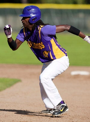 Akintunde Ahmad hit almost .500 his junior
season and was a big threat on the bases.
