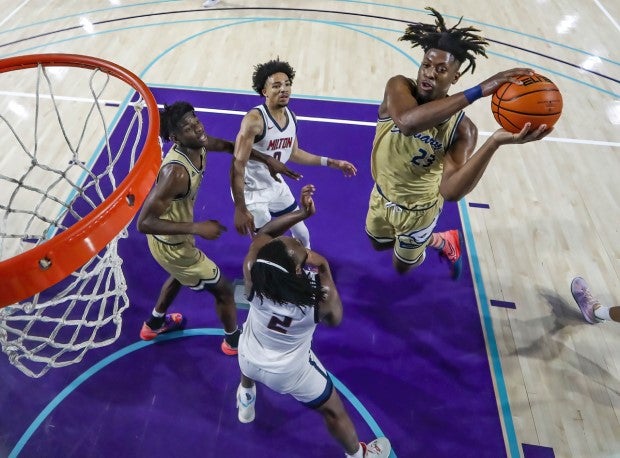 Gregg Glenn of Calvary Christian Academy flies to the hoop against Milton (Ga.) in the City of Palms Classic.