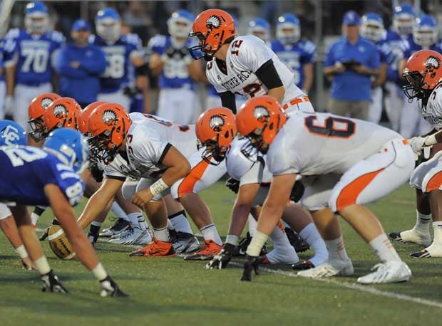 Brother Rice quarterback Alex Malzone calling signals.
