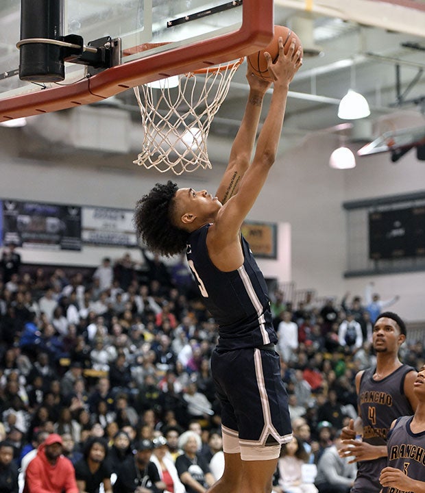 Brandon Boston Jr. soars for a reserve dunk.