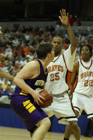 Randy Timmons (25) defends against TJ Ireland.