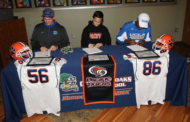 Three Cosumnes Oaks High School athletes - two football and one soccer - signed their letters of intent during a signing day event held in the Culinary Arts Building on campus Wednesday morning. (Left to right): Kameron Schroeder, Collin Bettencourt and Alex Van Dyke Jr.