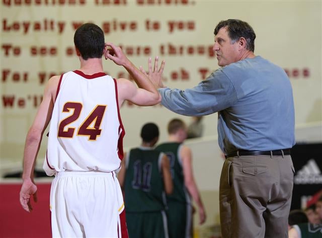 Coach Olive directs a weary Newquist.