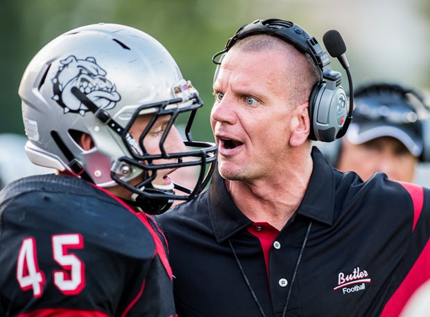 The intensity of North Carolina football is displayed by this Butler coach in a game last August against Ballard Creek.
