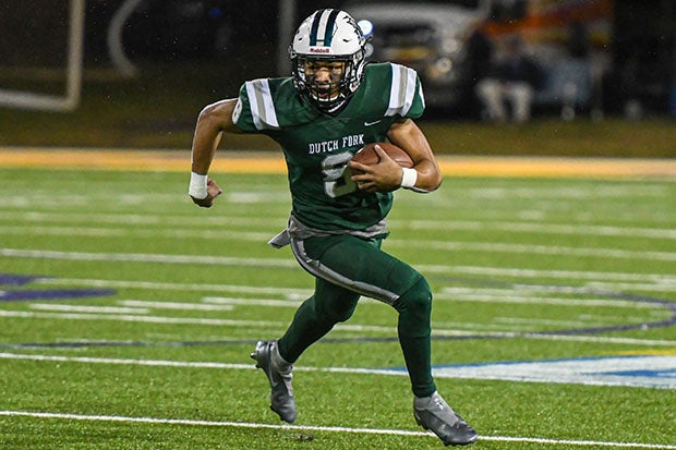 Antonio Williams of Dutch Fork heads upfield during last season's state championship game.