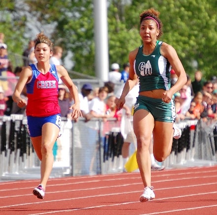 George Washington sophomore Chyna Ries, right, and Cherry Creek junior Emily Romo sprint to the finish during the preliminaries of the Class 5A 100 meters at Jefferson County Stadium.