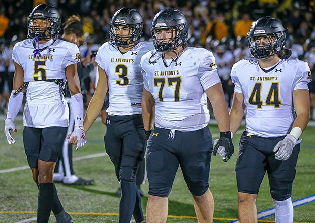 Dante Torres (3) takes the field for the coin flip prior to an October matchup with Fordham Prep. (Photo: Derrick Dingle)