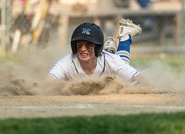 Kennebunk's (Maine) James DiGiovanni slides home with the game winning run in the bottom of the seventh inning in a 2-1 victory over Sanford.