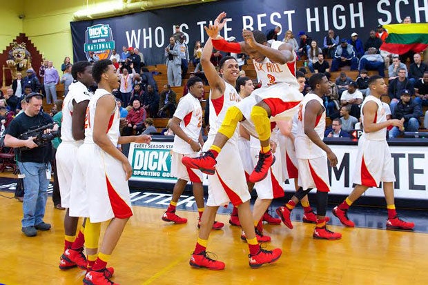Oak Hill Academy celebrates after overcoming a 10-point halftime deficit Friday against Findlay Prep.