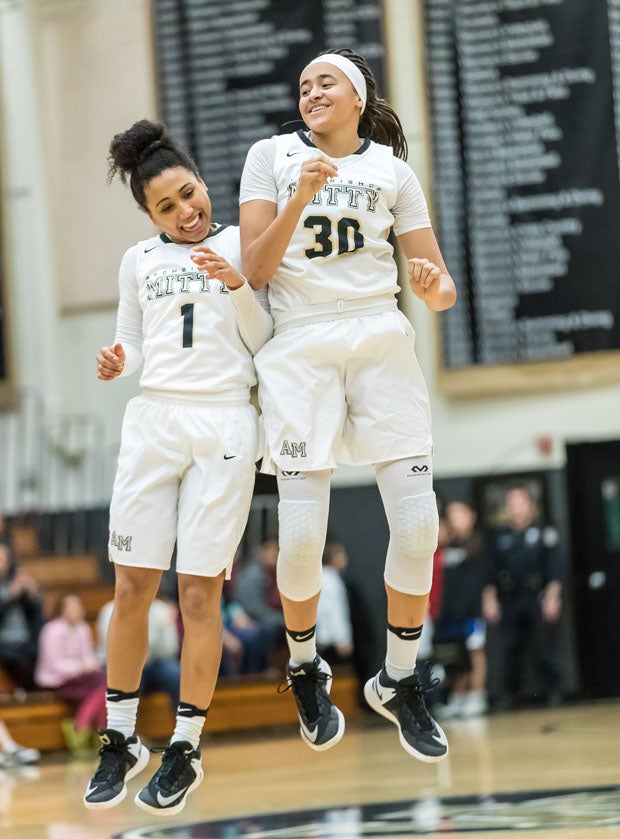 Heleyna Hill (left) and Haley Jones enjoy another winning moment for Mitty. 