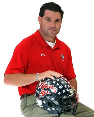 Head coach Lance Pogue.