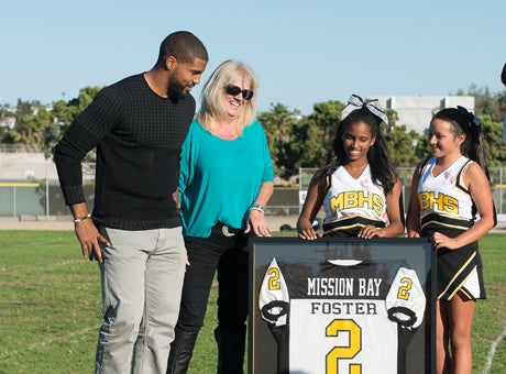 Houston Texans running and the NFL's leading rusher Arian Foster took some time from his bye week to attend a ceremony at Mission Bay High School in San Diego, where they retired his No. 2. Foster rushed for more than 2,000 yards and 24 touchdowns his senior year at Mission Bay. 