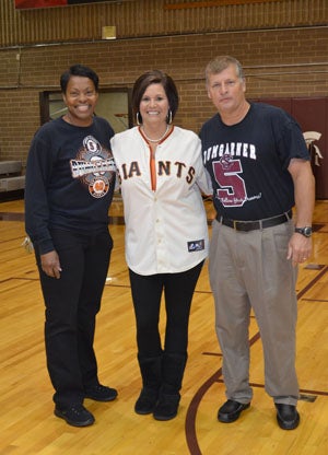 On MadBum Day last week, coach Jeff Parham (R)
with wife Mandi Parham (middle) and coach 
Karen Isbell.