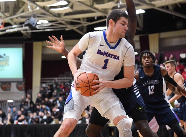 Hunter Dickinson makes a move in the post during his junior season with DeMatha.