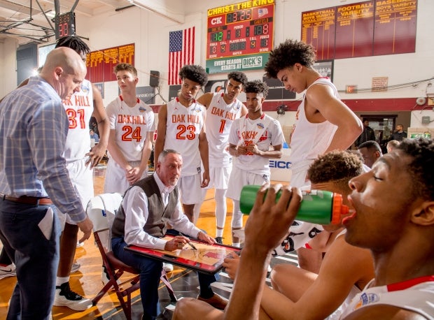 Oak Hill Academy head coach Steve Smith gives instructions to his team Thursday at GEICO Nationals.