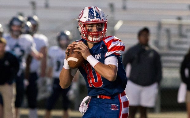 North Carolina's Sam Hartman continued the quarterback legacy at Davidson Day by throwing for over 3,700 yards and 45 touchdowns last season.