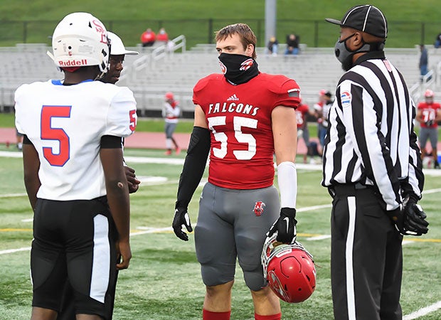 Team captains meet at midfield for the coin toss before the Sept. 10 kickoff between Southeast at Van Horn in Missouri.