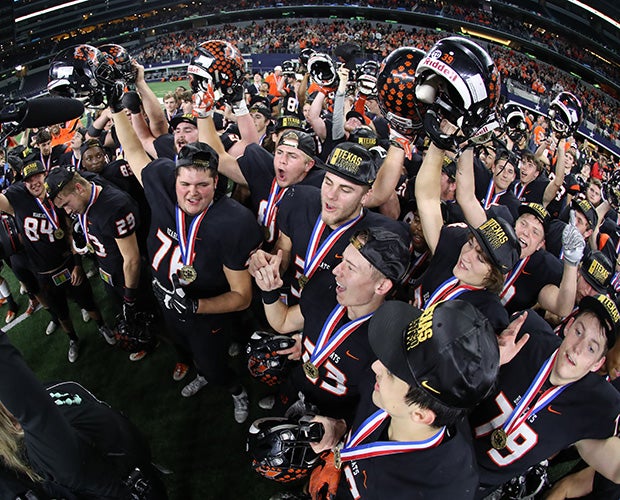 Aledo players celebrate winning the Texas 5A Division II championship at AT&T Stadium on Friday night.