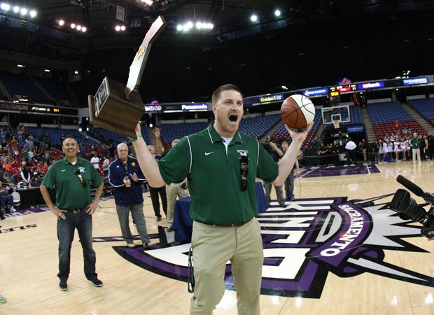 Manteca coach Brett Lewis enjoys the moment, a first-ever championship for Manteca. 