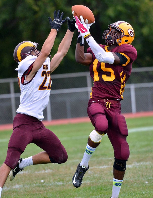 Glassboro (N.J.) receiver Quentin Parham makes a catch in front of Gloucester Catholic safety Colin Corrado.