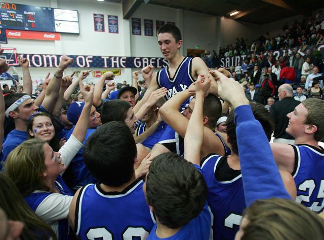 Analy's Max Fujii is carried off court after heroic game.
