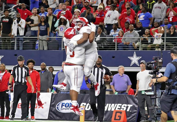 Jordan Revels (95) celebrates like North Shore just clinched the championship. The Mustangs didn't of course, but they did about six minutes later.