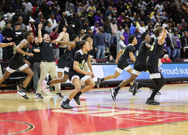 Roselle Catholic celebrates 61-58 overtime win over Camden in final New Jersey TOC title game. 