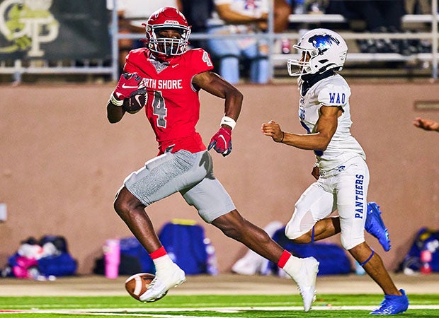 Senior wide receiver Kendrick Deblanc attempts to run away from a defender last week in North Shore's 42-14 in over King. Deblanc is one of five Mustang pass-catchers with 230 yards or more this season. (Photo: Rafael Lopez)