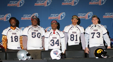 Paul James (18), Donovan Munger (50), Terrell Newby (34), Derrick Willies (81) and Colin Goebel (73) pose during the 2013 USA Football Signing Day Breakfast at The Renaissance Hotel Austin.
