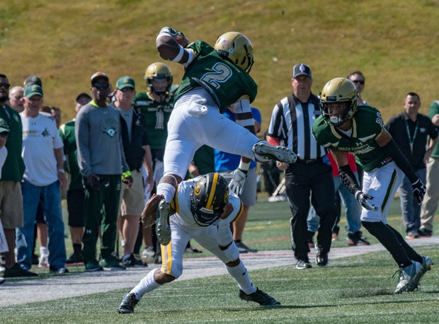 St. Joseph Regional running back Audric Estime (2) takes flight.